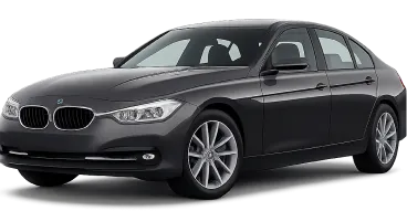 A dark gray BMW sedan is shown from a front-side angle. The car has sleek lines, prominent headlights, and the iconic BMW kidney grille. The vehicle is parked on a plain background.