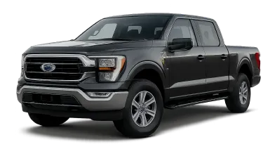 A black Ford F-150 pickup truck with four doors is parked on a plain background, facing slightly to the left. The truck features chrome accents on the grille and bumper.