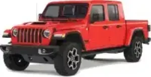 A red four-door pickup truck with black trim and large tires, viewed from the front left side, isolated on a white background.