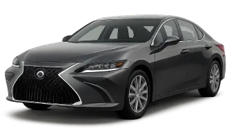 A dark gray Lexus ES sedan is viewed from the front left angle, showcasing its distinctive spindle grille, sleek headlights, and modern, aerodynamic design.
