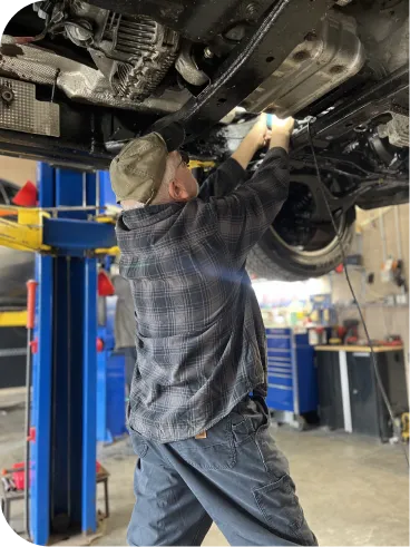 a man working on a car