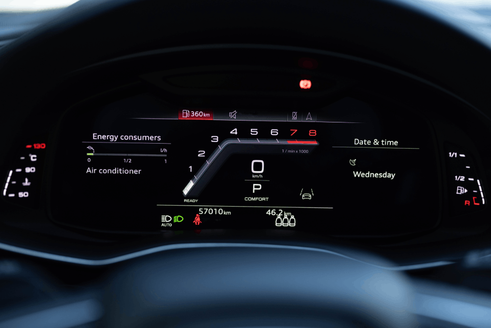 Hybrid warning lighst, auto repair in Newbury, MA, at Angie's Service Inc. Image of a hybrid car’s dashboard warning lights and driver information, illustrating the importance of diagnosing dashboard warning indicators before they lead to more serious vehicle problems.